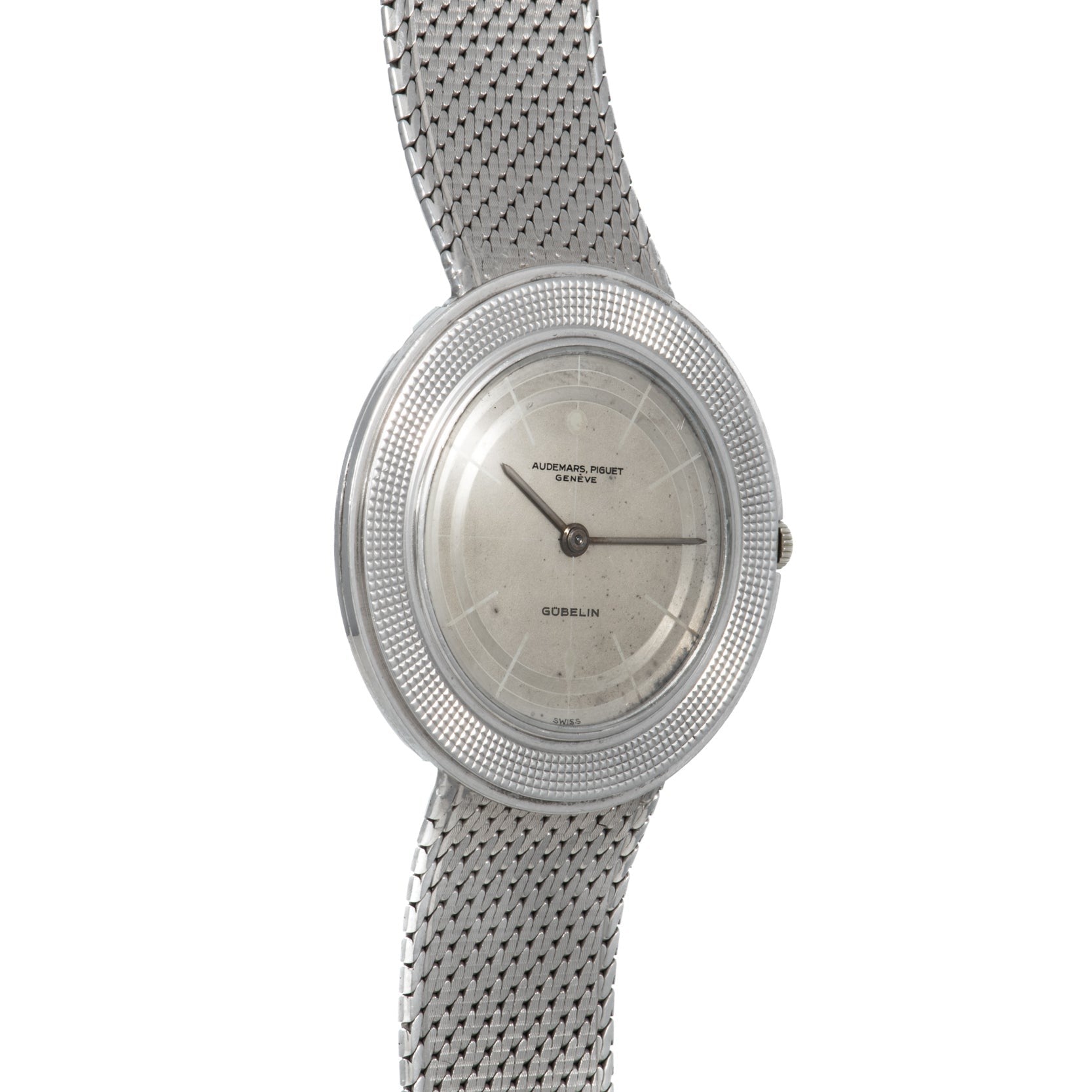 A silver Audemars Piguet Signed Disco Volante Dress Watch Gübelin featuring a mesh band and a minimalistic round face.