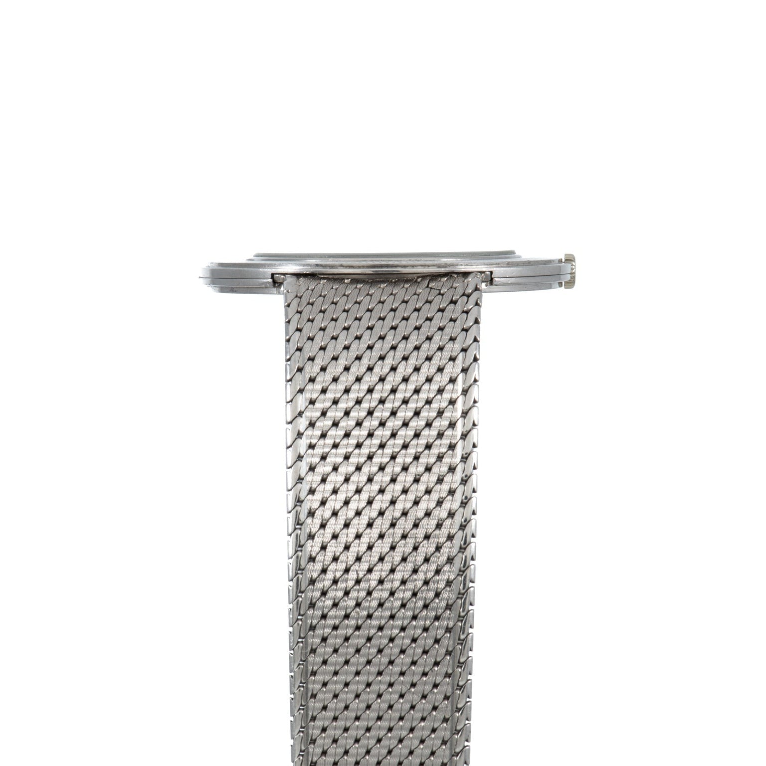 Side view close-up of a silver mesh metal band attached to an Audemars Piguet Signed Disco Volante Dress Watch Gübelin.