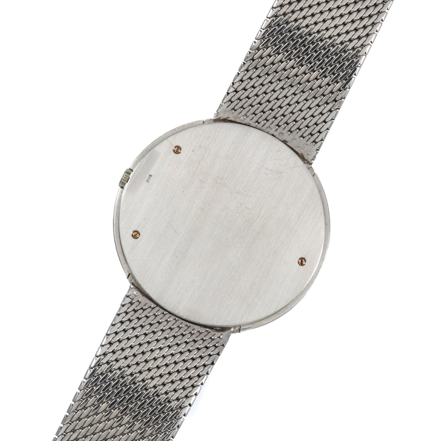 The Audemars Piguet Signed Disco Volante Dress Watch Gübelin features a silver mesh band and is shown from the back, with no visible markings or logos.