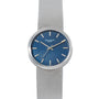 The Patek Philippe Calatrava Backwind features a textured silver band and a blue textured dial, displaying the time as 10:09.
