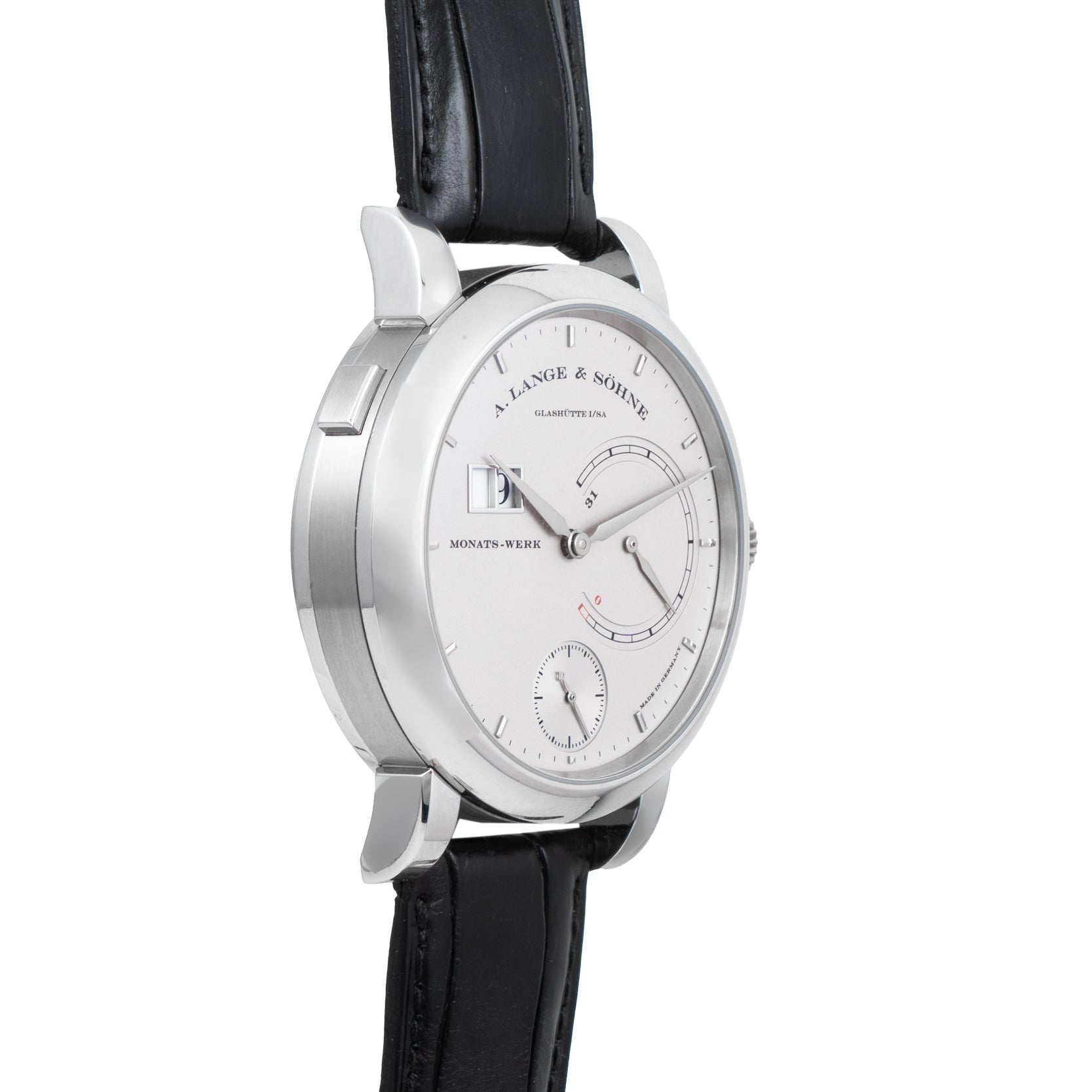 A Lange & Sohne Lange 31 wristwatch in silver with a white dial and black leather strap, shown from an angled view.