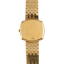 A Piaget Yellow Gold Hobnail Dress Watch featuring a square blank face and a linked gold band, viewed from above.