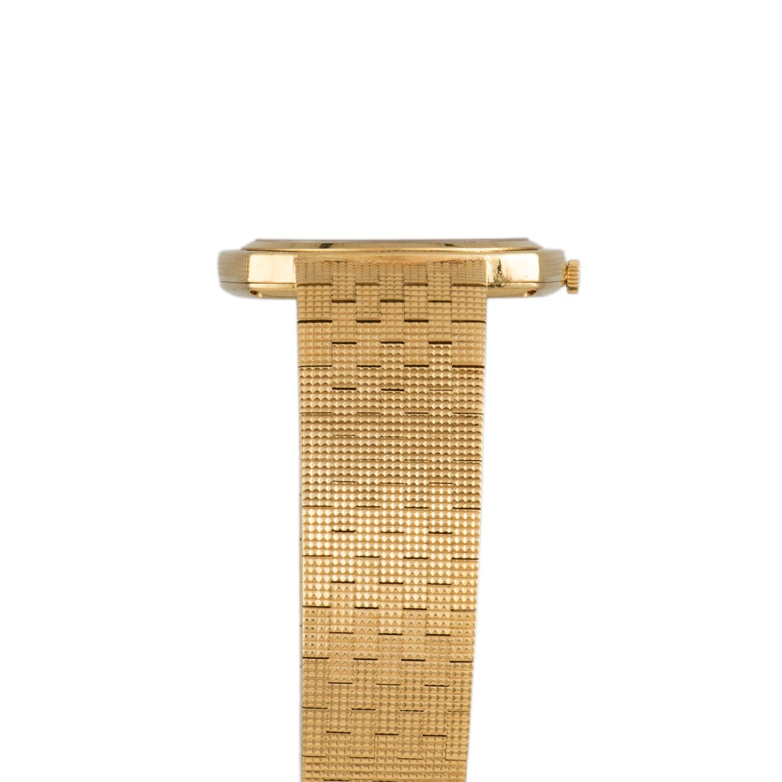 Side view of the Piaget Yellow Gold Hobnail Dress Watch featuring a textured metal band, shown against a white background.