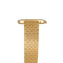 Side view of the Piaget Yellow Gold Hobnail Dress Watch featuring a textured metal band, shown against a white background.
