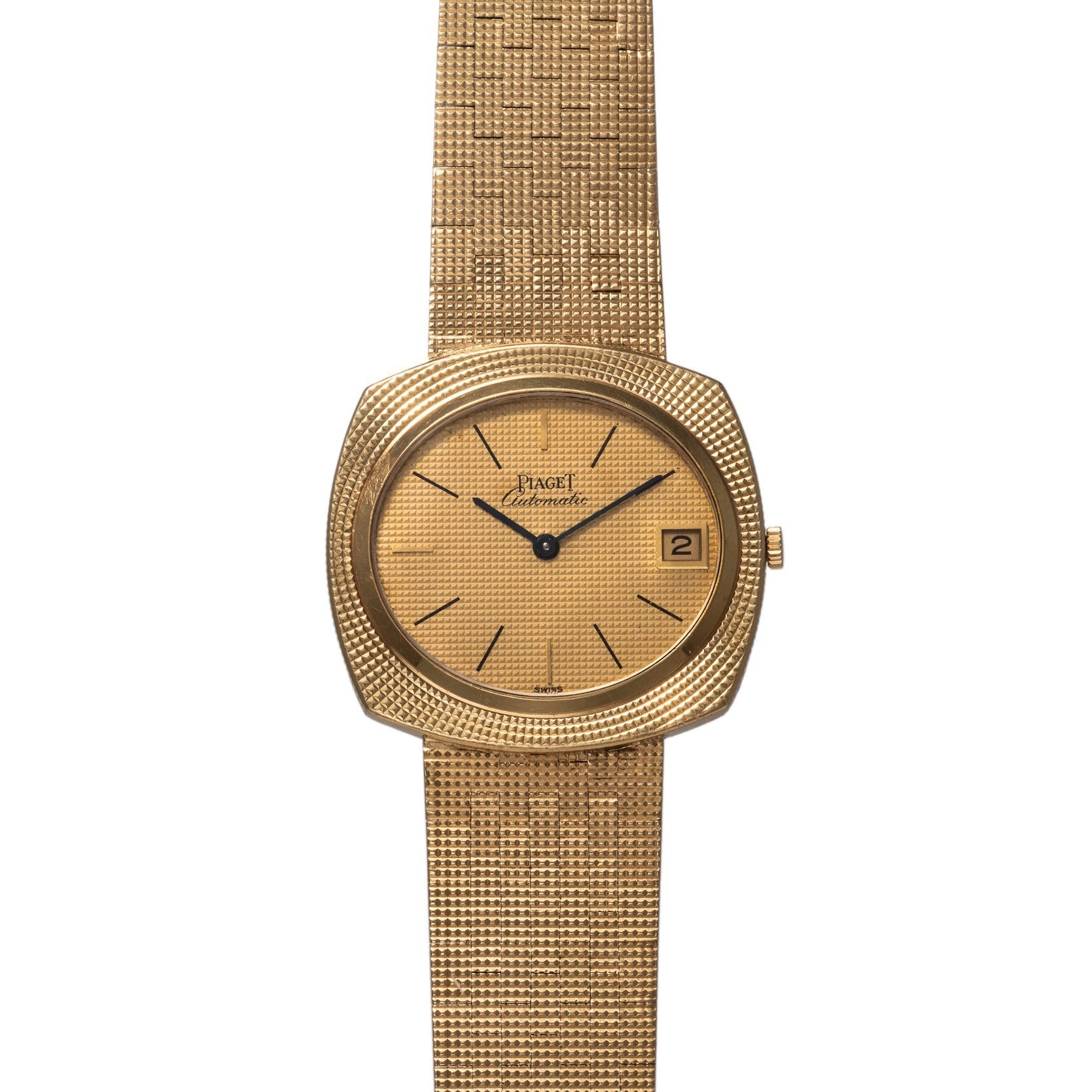 Piaget Yellow Gold Hobnail Dress Watch featuring a textured band, simple black hour markers, and a date window at 3 oclock.