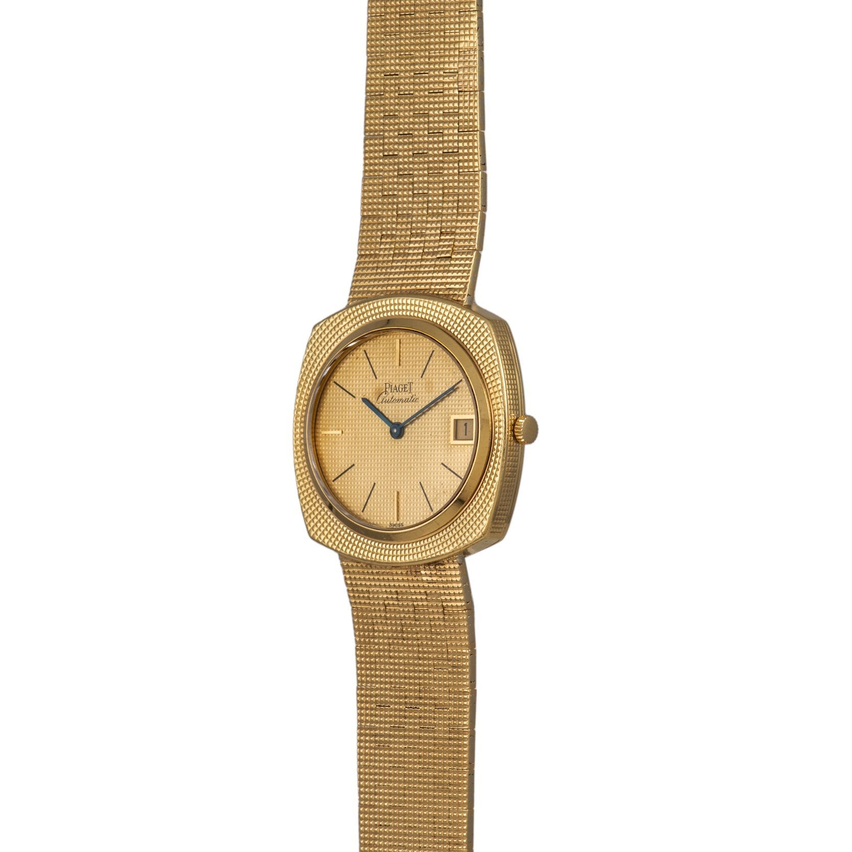 The Piaget Yellow Gold Hobnail Dress Watch features a square face, a textured band, and simple hour and minute hands.