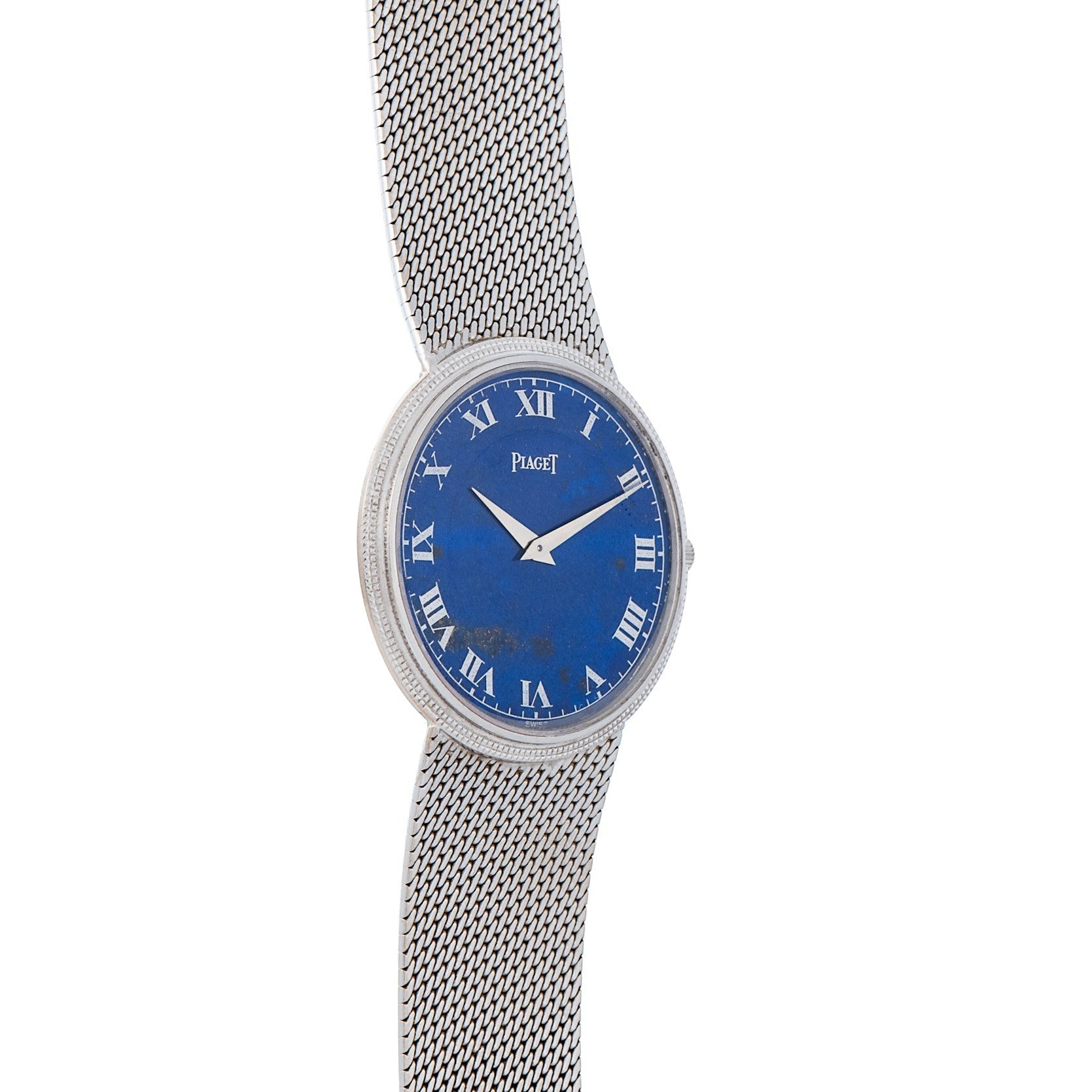 The Piaget Lapis Lazuli Dress Watch features a silver mesh strap, blue face, Roman numerals, and Piaget branding at the center.