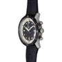 The Breitling Superocean Slow Counting Chronograph, featuring a black bezel, black strap, and silver case, is displayed at an angle.