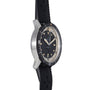 Side view of the Breitling Superocean Slow Counting Chronograph, featuring a black and silver case, black perforated strap, and rotating bezel.