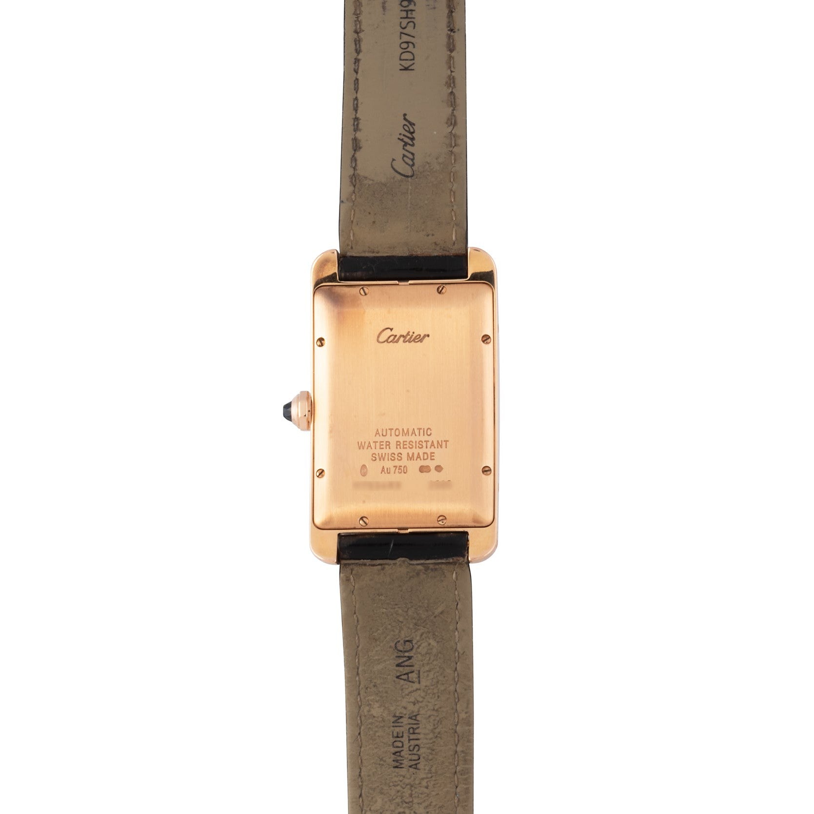 Back view of the Cartier Tank Americaine wristwatch featuring a tan leather strap and visible engravings on the case back.