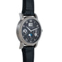 The Lange & Sohne Langematik Perpetual Calendar is a luxury wristwatch with a black leather strap, black dial, Roman numerals, and multiple subdials.