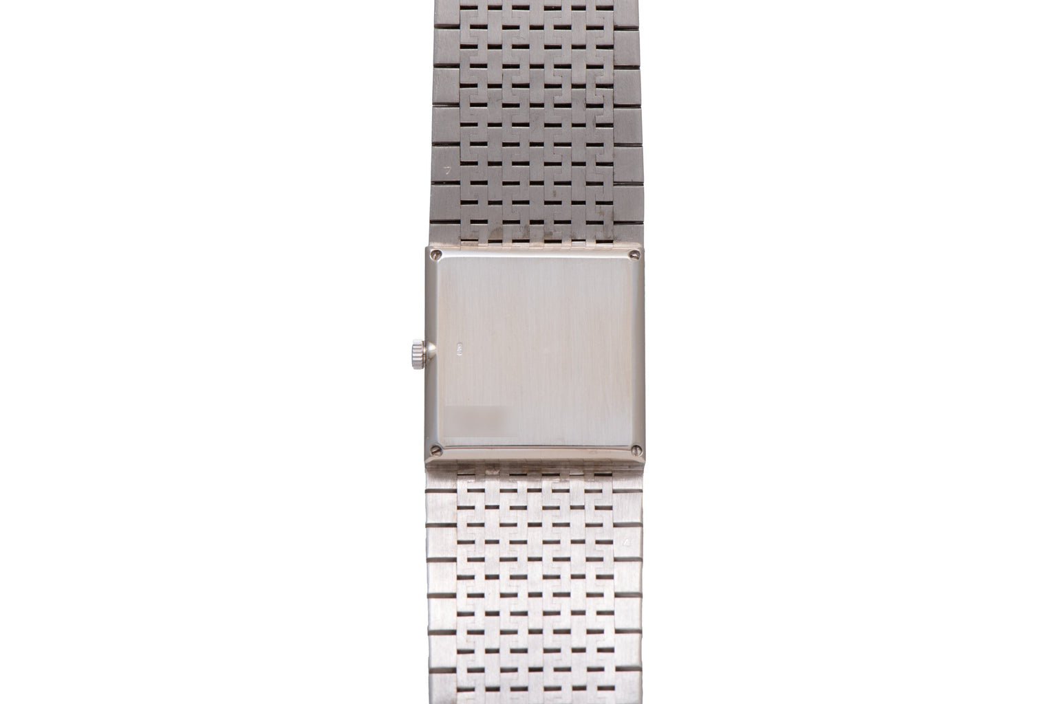 The Piaget White Gold Malachite Dress Watch features a square blank face and a linked band, showcased against a white background.