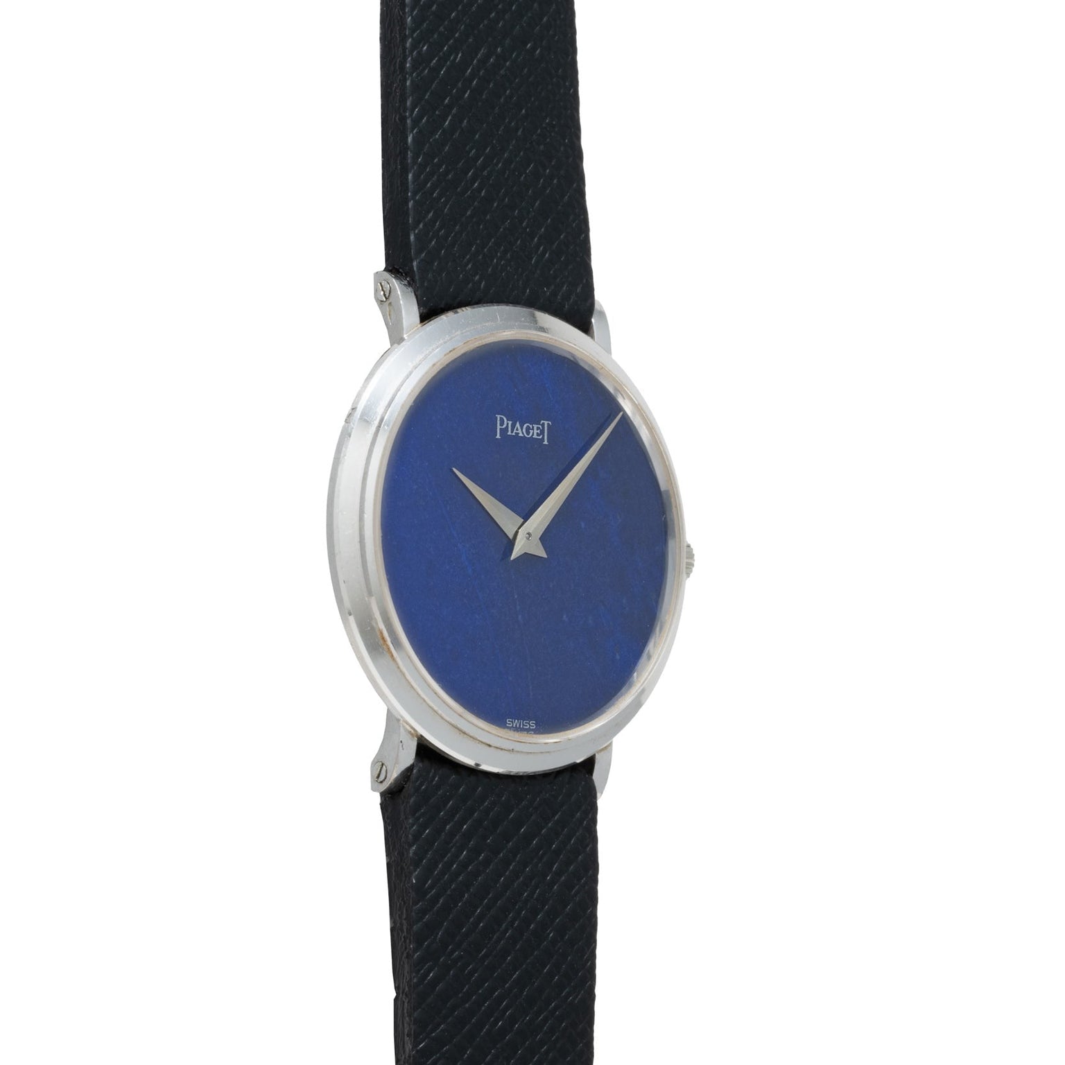 The Piaget Ladies Lapis Lazuli Dress Watch features a blue lapis face, silver casing, and black textured strap, shown at an angle.