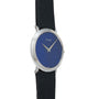 The Piaget Ladies Lapis Lazuli Dress Watch features a blue lapis face, silver casing, and black textured strap, shown at an angle.
