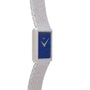 Piaget White Gold Lapis Lazuli Dress Watch featuring a rectangular case, textured band, and blue lapis lazuli face displaying 8:00.