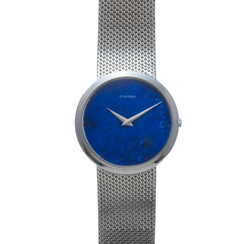 A Cartier White Gold Lapis wristwatch with a mesh band and blue lapis dial, featuring no hour markers.