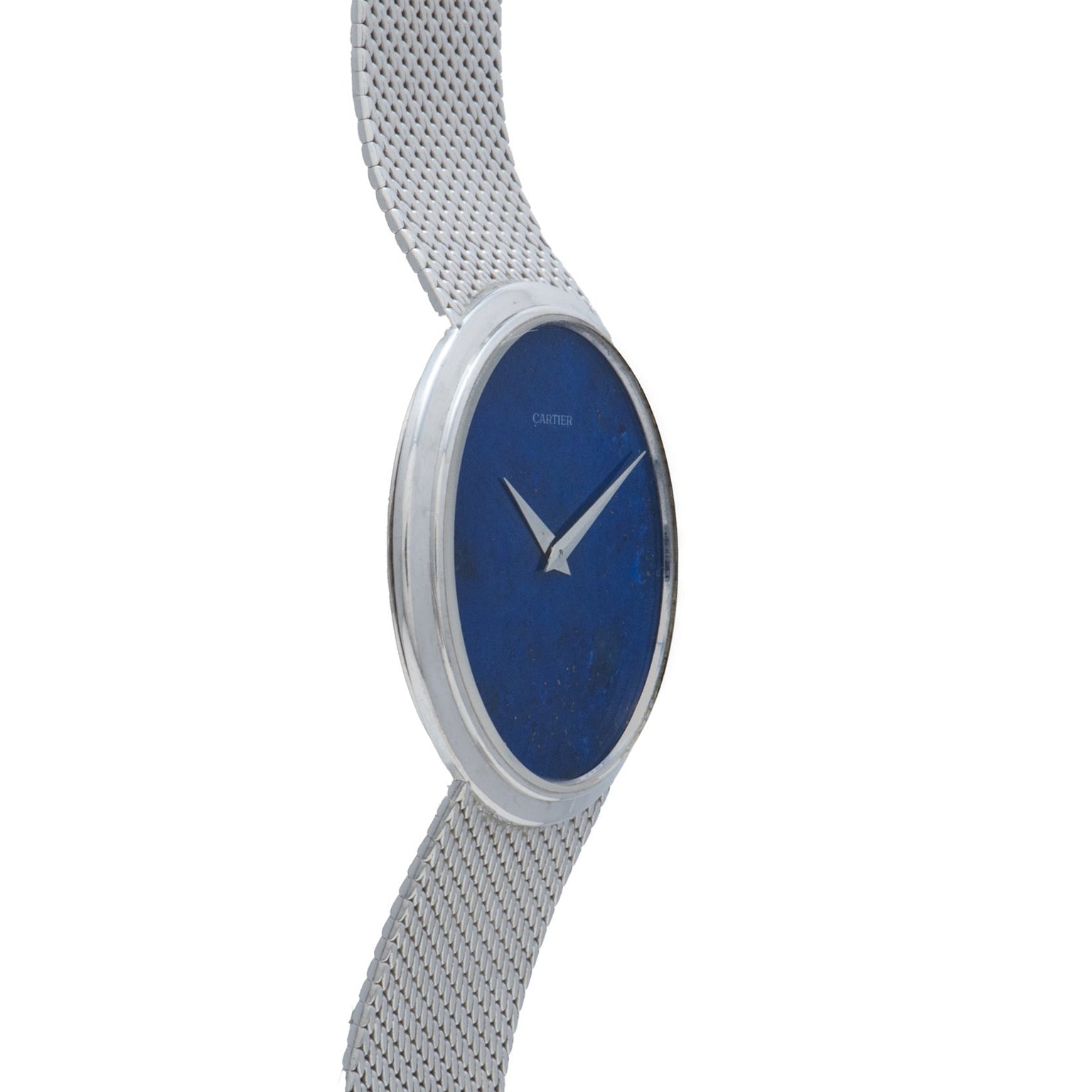 The Cartier White Gold Lapis watch features a blue face without numbers and a silver mesh band, displayed from a side angle.