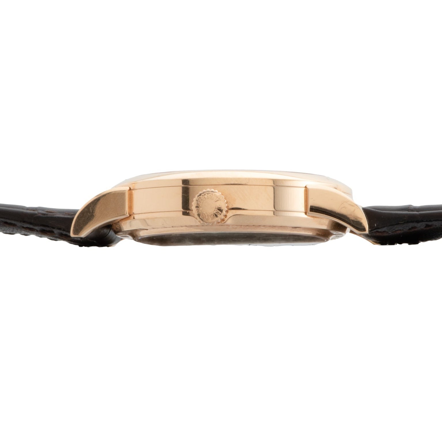 Side view of the Lange & Sohne Lange 1 Tourbillon gold case with a black leather strap and visible crown.
