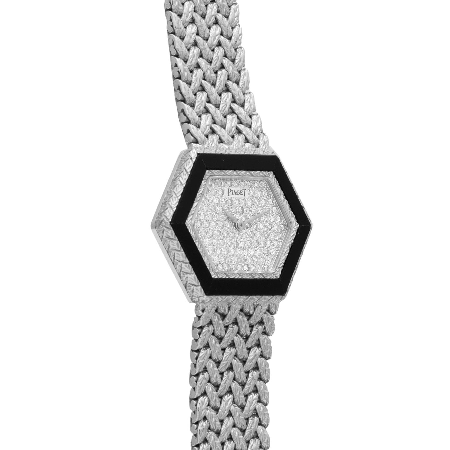 The Piaget Hexagonal Diamond Dress Watch features a woven silver band and a black bezel.