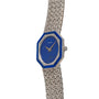 The Piaget Lapis Lazuli White Gold Dress Watch features a blue octagonal face and textured metal band, displaying 10:10.