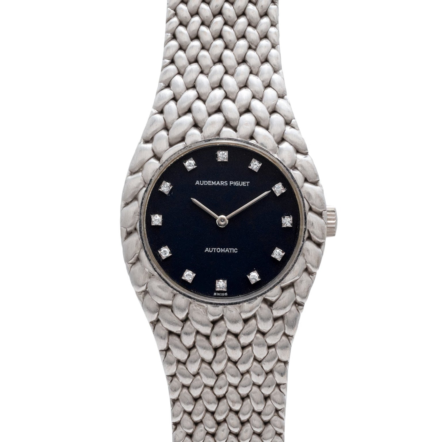 An Audemars Piguet Cobra watch in silver with a black face and diamond hour markers.