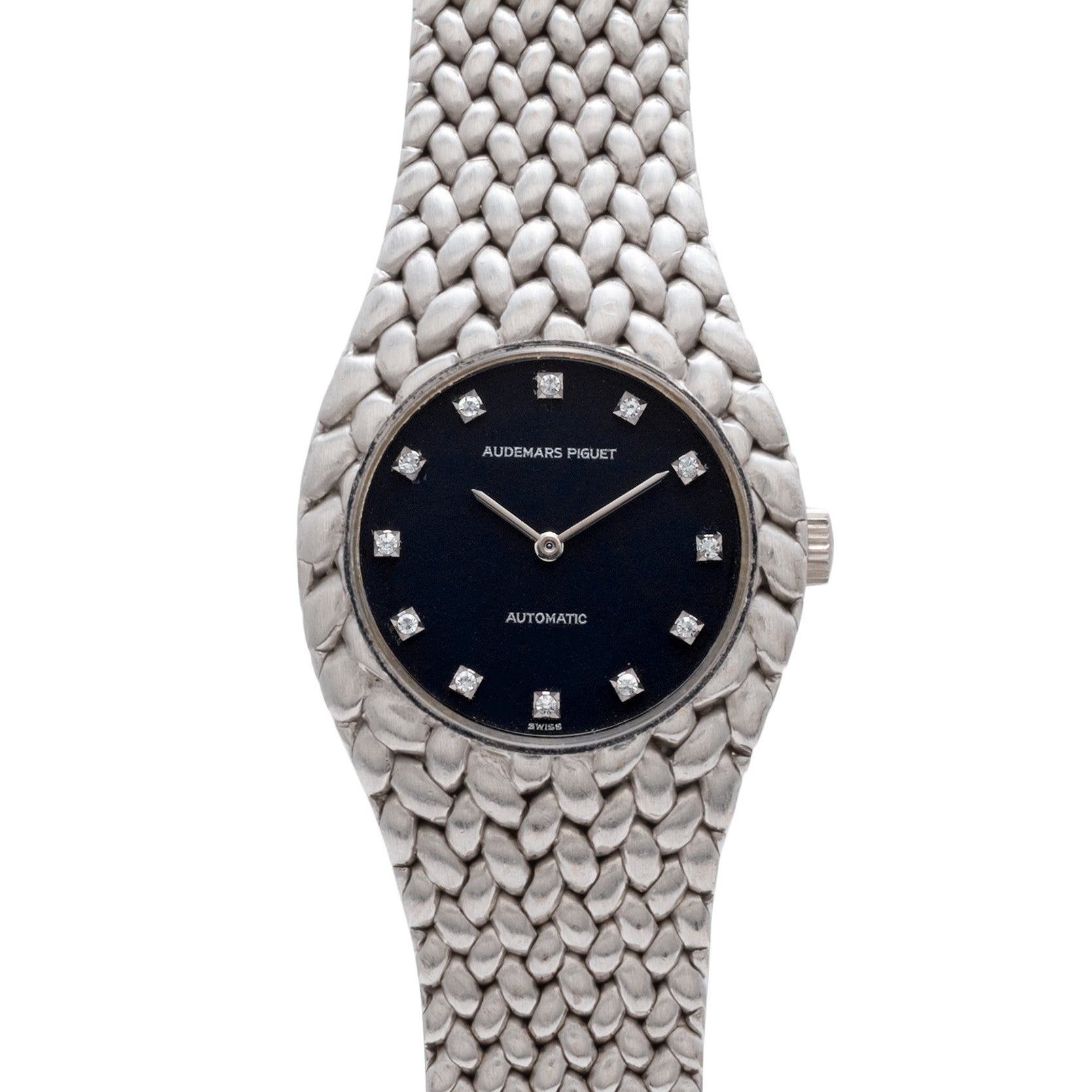 An Audemars Piguet Cobra watch in silver with a black face and diamond hour markers.
