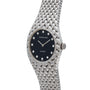 The Audemars Piguet Cobra is a silver wristwatch with a black face, diamond hour markers, and a textured metal band.