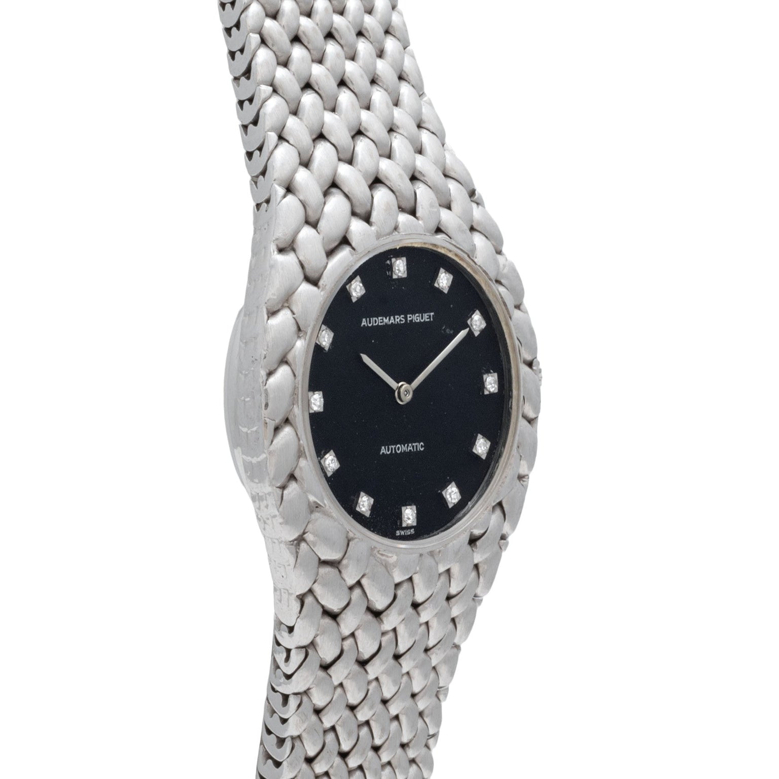 Audemars Piguet Cobra watch in silver, featuring a black face with diamond hour markers and a textured band.