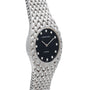 Audemars Piguet Cobra watch in silver, featuring a black face with diamond hour markers and a textured band.