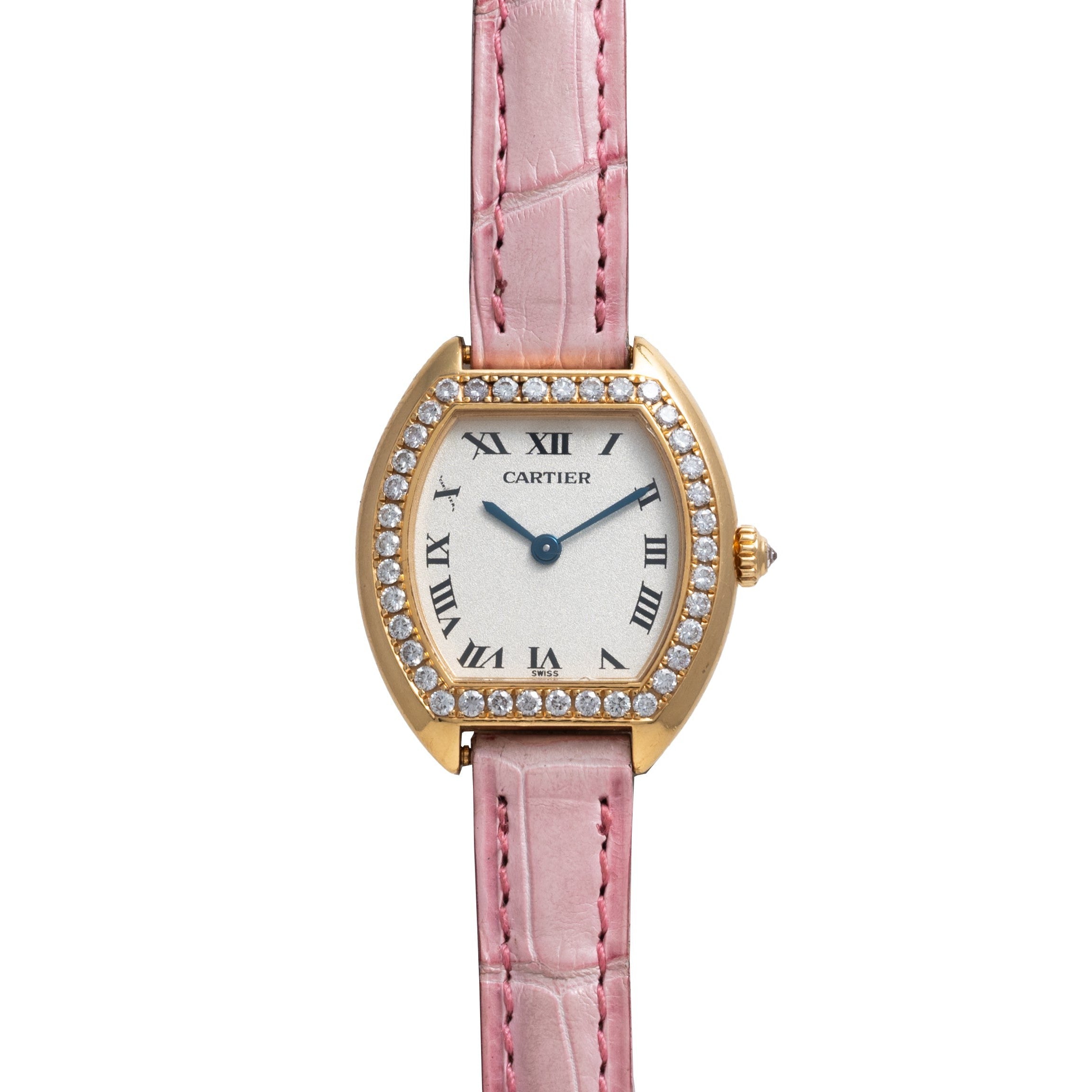 Cartier Tortue watch with diamond bezel, Roman numerals, and pink leather strap displayed on a white background.