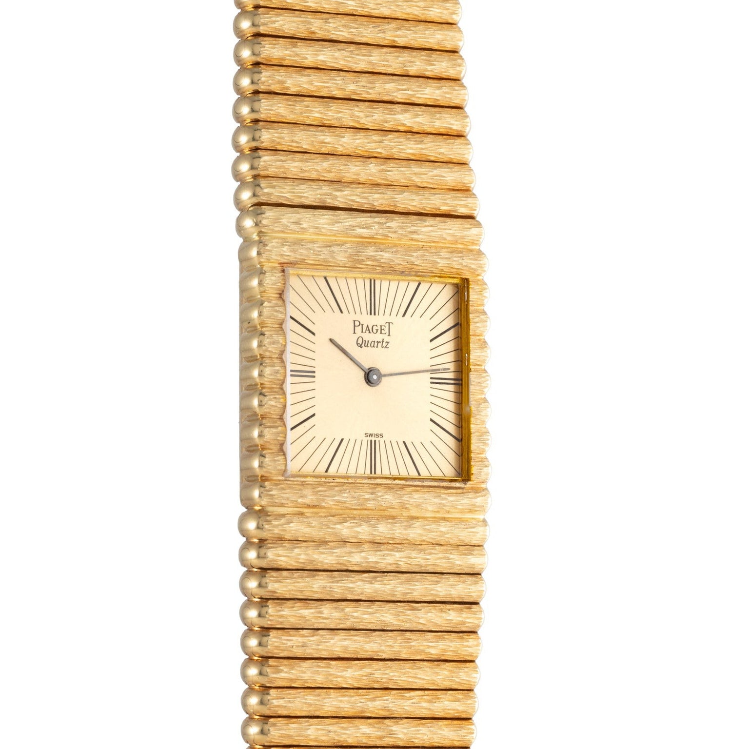 Piaget Emperador gold quartz wristwatch featuring a square face and textured gold bracelet, displaying the time 9:06.