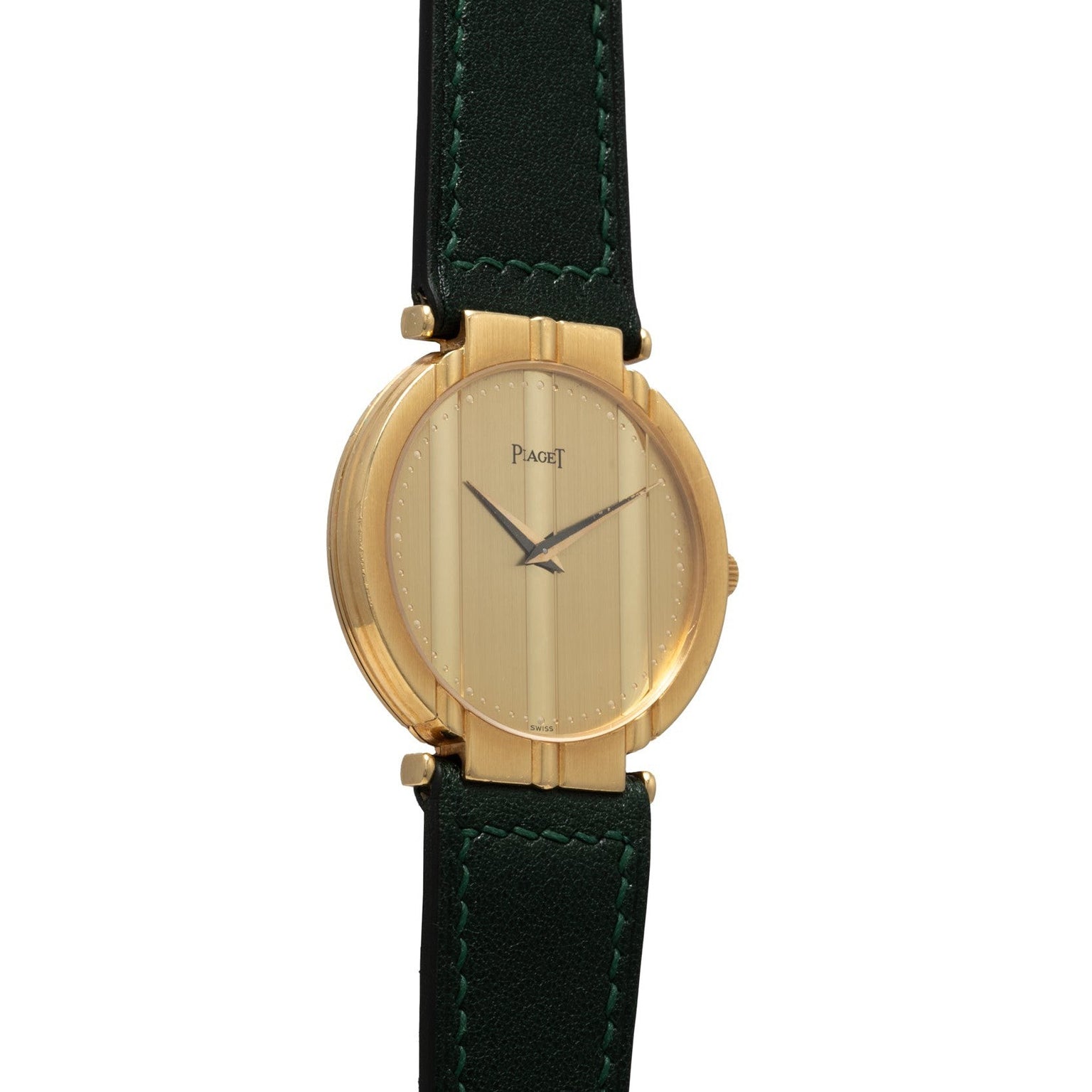 The Piaget Polo Large wristwatch features a round gold face, a gold dial, and a black leather strap with green stitching.
