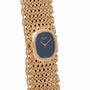 Patek Philippe Ellipse Ladies Woven Cuff: gold mesh bracelet watch with a black dial and gold hands, shown on a plain white background.