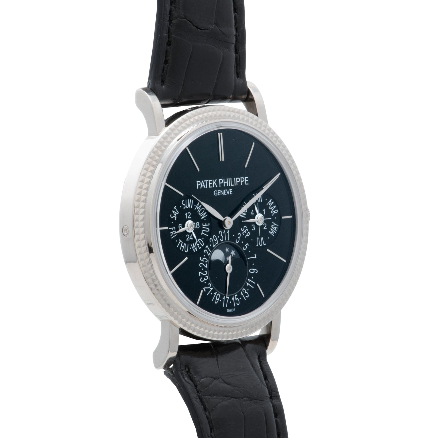 A Patek Philippe Perpetual Calendar Moonphase wristwatch in black with a silver case and multiple dials.