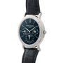 The Patek Philippe Perpetual Calendar Moonphase features a black leather strap and an intricate black dial with multiple subdials.