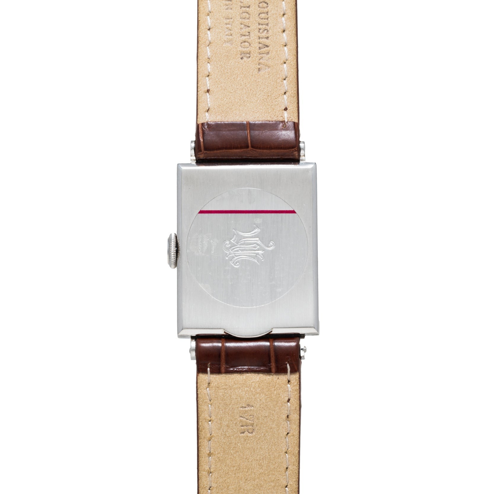 The back view of the Vacheron Constantin Rectangular Steel Dress Watch displays its engraved logo and features a brown leather strap.