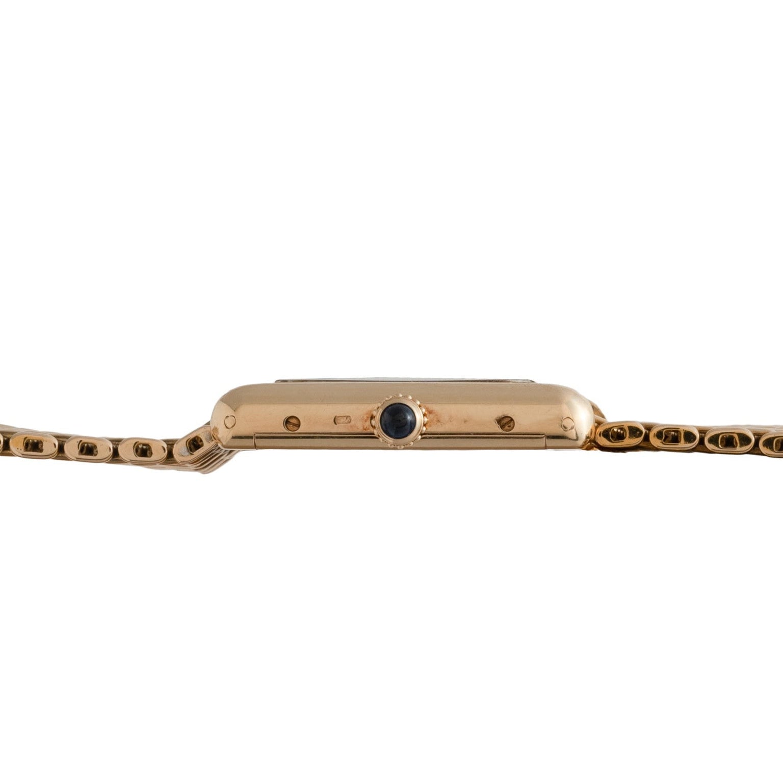 Side view of the Cartier Tank Louis gold wristwatch featuring a linked band and a round black crown.