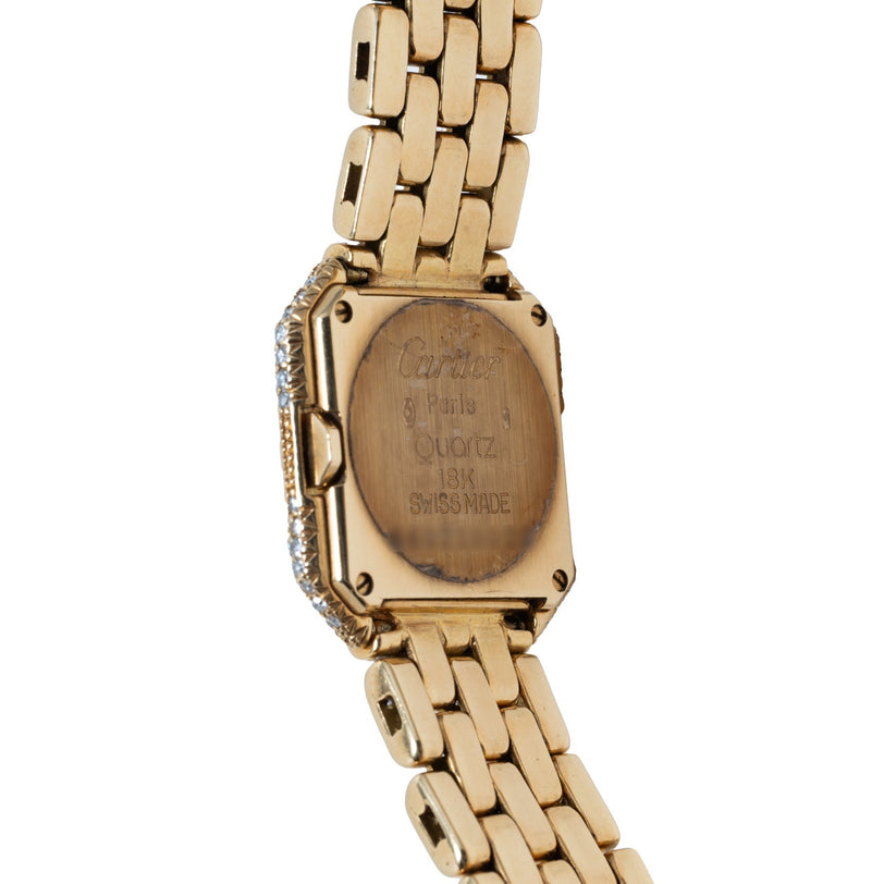 Back view of the Cartier Ceinture Paris Diamond wristwatch in gold, featuring an engraved case and a linked bracelet.