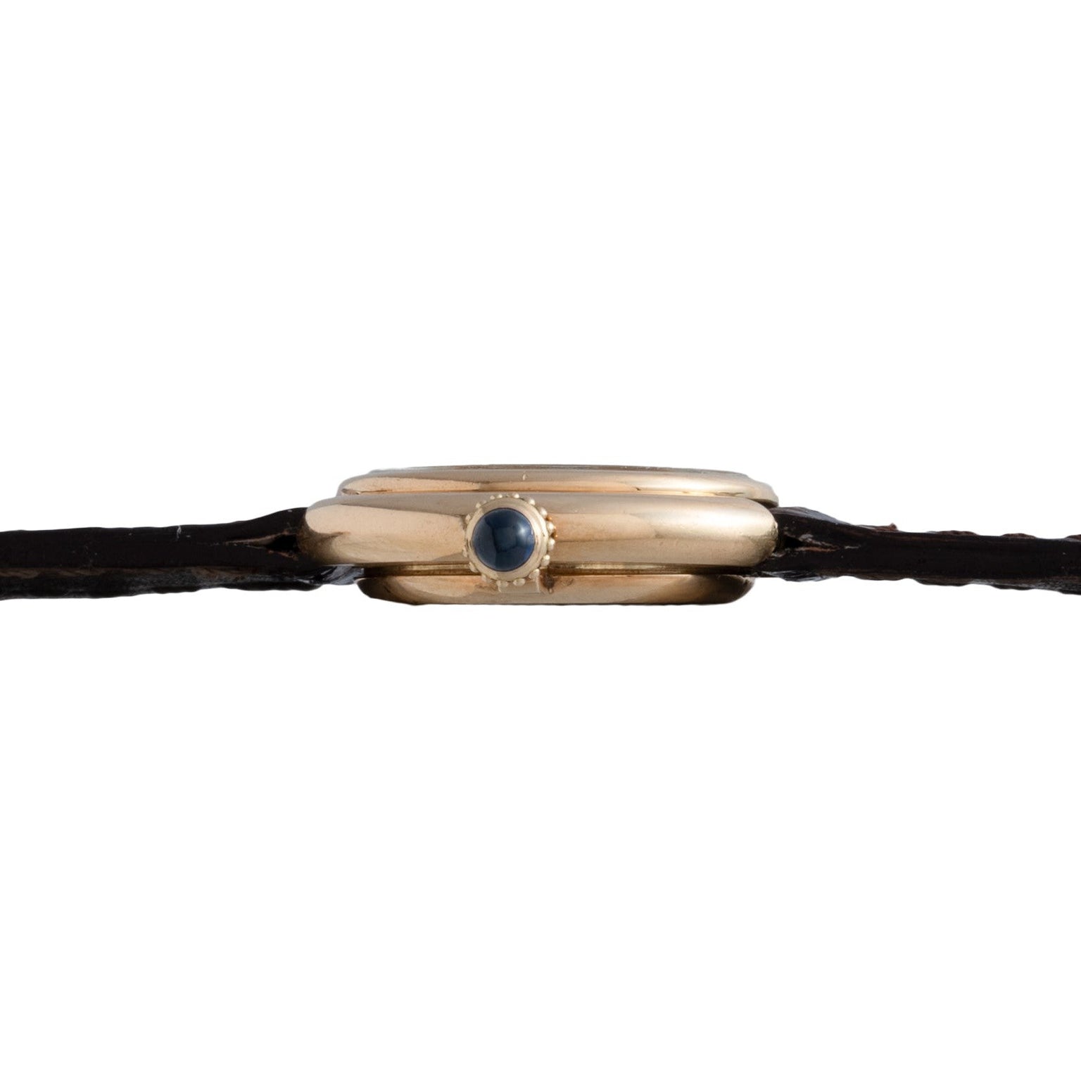 Side view of the Cartier Vendome gold wristwatch featuring a dark round crown and a thin black leather strap.