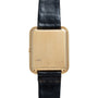 A square Piaget Tank Blue Lapis watch back with QUARTZ engraved, set on a black leather strap.