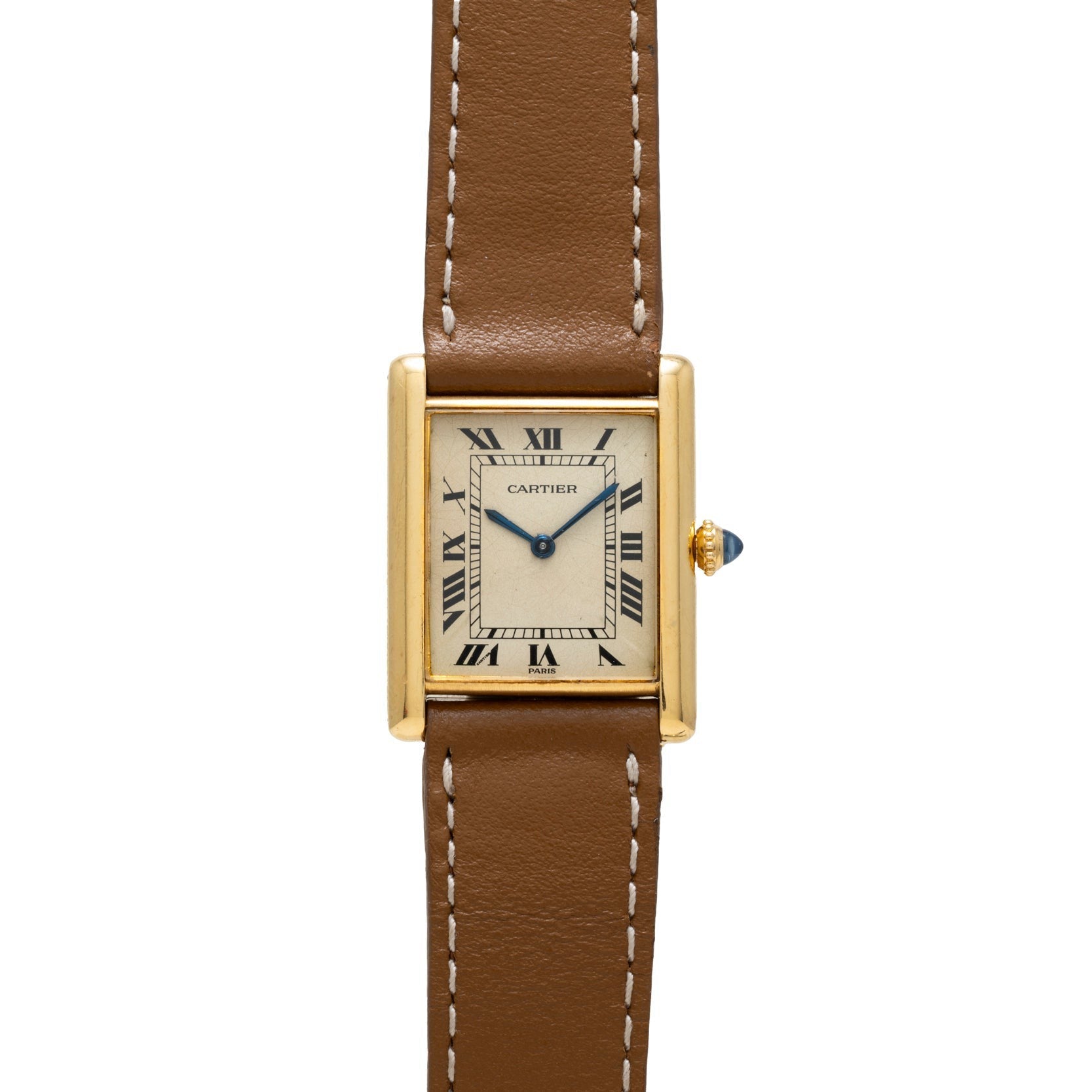 The Cartier Tank Louis is a gold watch featuring a square face, Roman numerals, and a brown leather strap with white stitching.