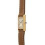Cartier Tank Louis rectangular watch featuring a brown leather strap and Roman numerals on a white dial, side view.
