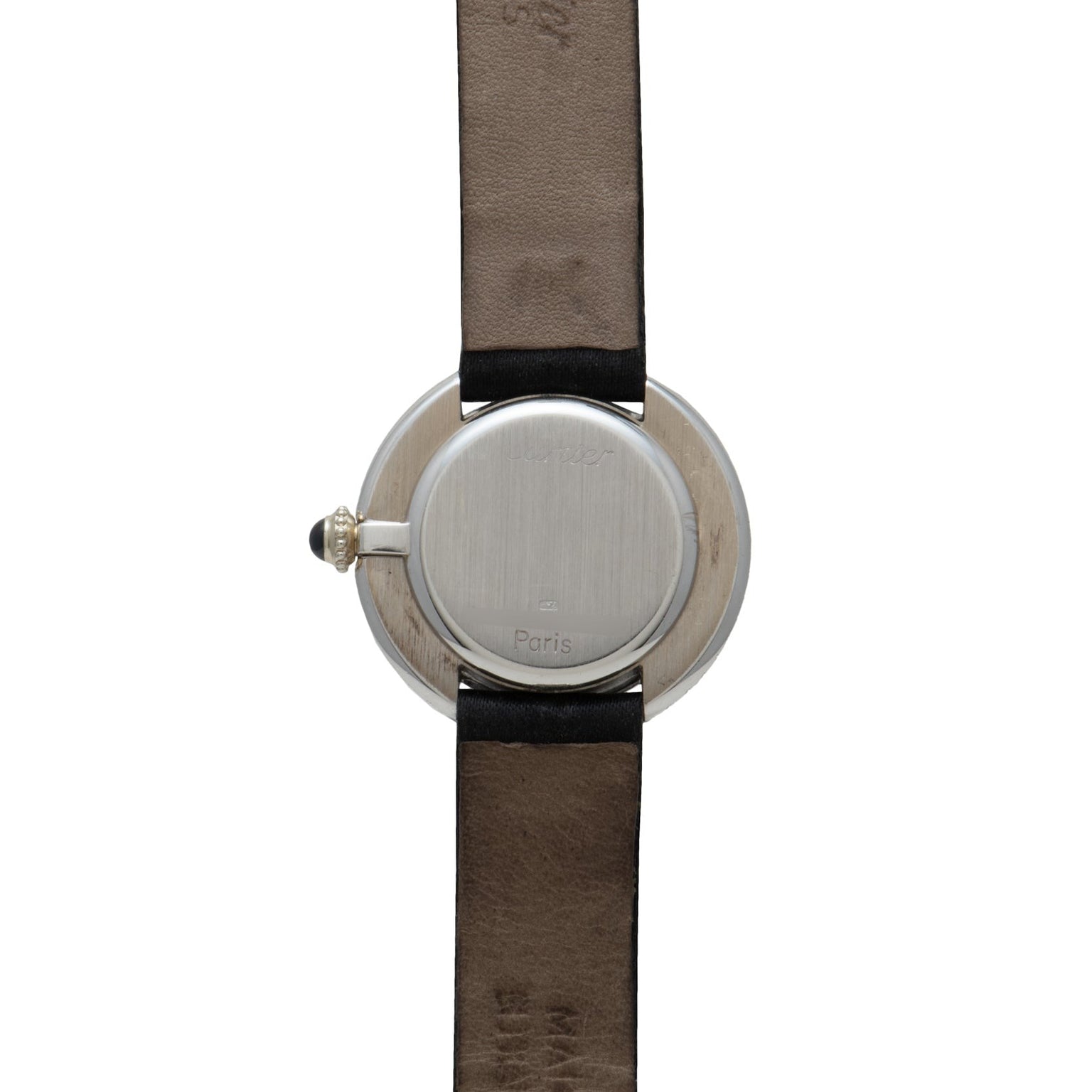 Back view of the Cartier Vendome Diamond wristwatch, featuring a round silver case with brown leather straps and an engraving that reads Paris.