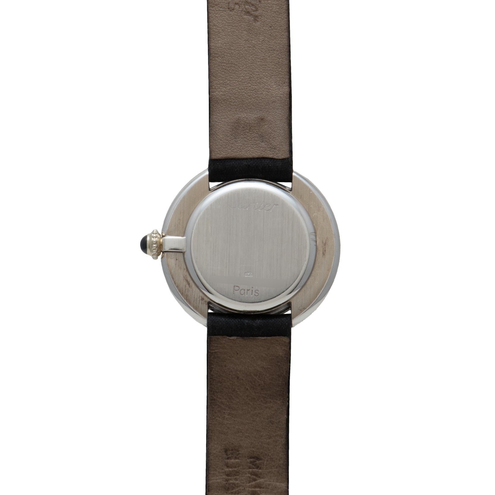 Back view of the Cartier Vendome Diamond wristwatch, featuring a round silver case with brown leather straps and an engraving that reads Paris.