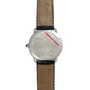 The Cartier Vendome Ronde Louis features a silver caseback with a leather strap, engraved text, and a red diagonal line across the case.