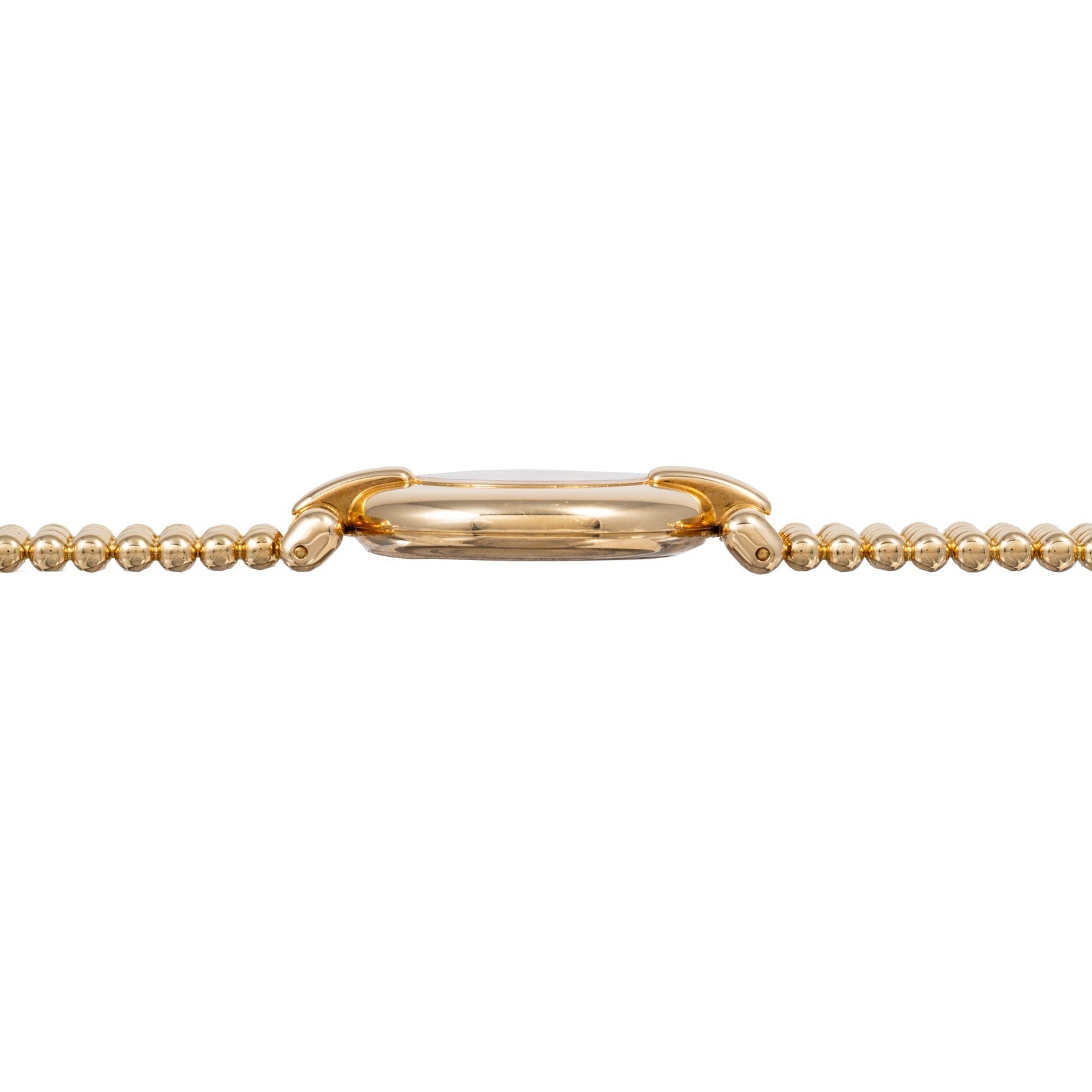 Side view of the Cartier Ladies Dress Watch featuring a gold beaded bracelet and a slim, rounded case.
