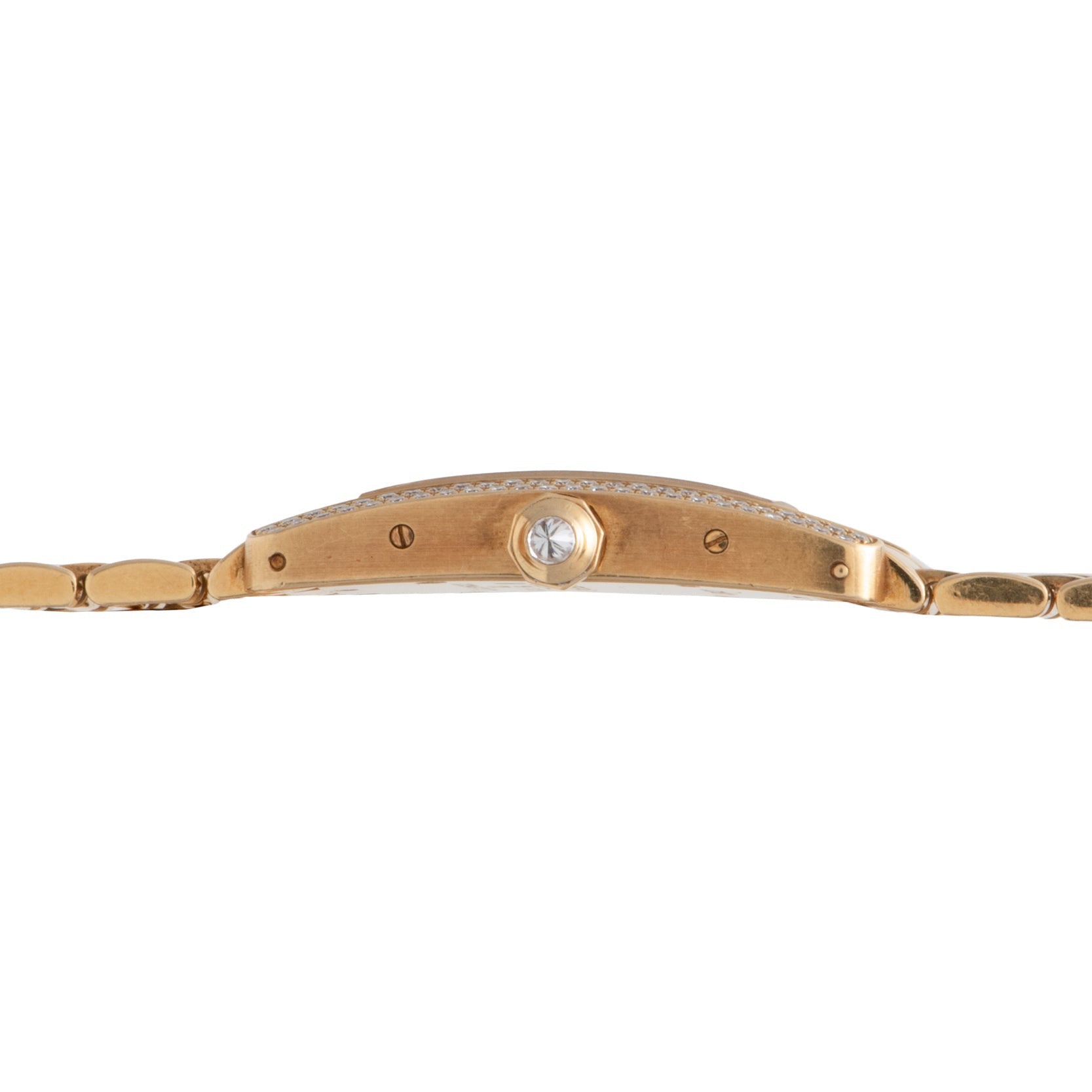 Side view of the Cartier Tank Americaine Diamond gold wristwatch featuring a round crown and slim, linked bracelet band.