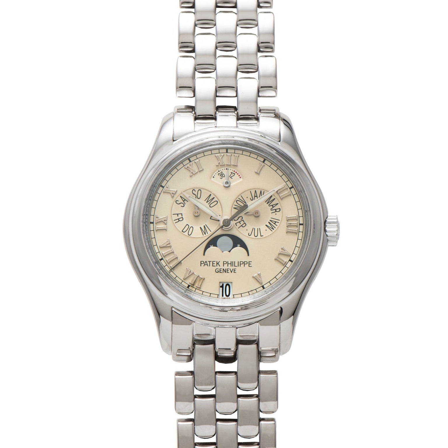 A silver Patek Philippe Annual Calendar wristwatch featuring a beige dial with multiple calendar displays.