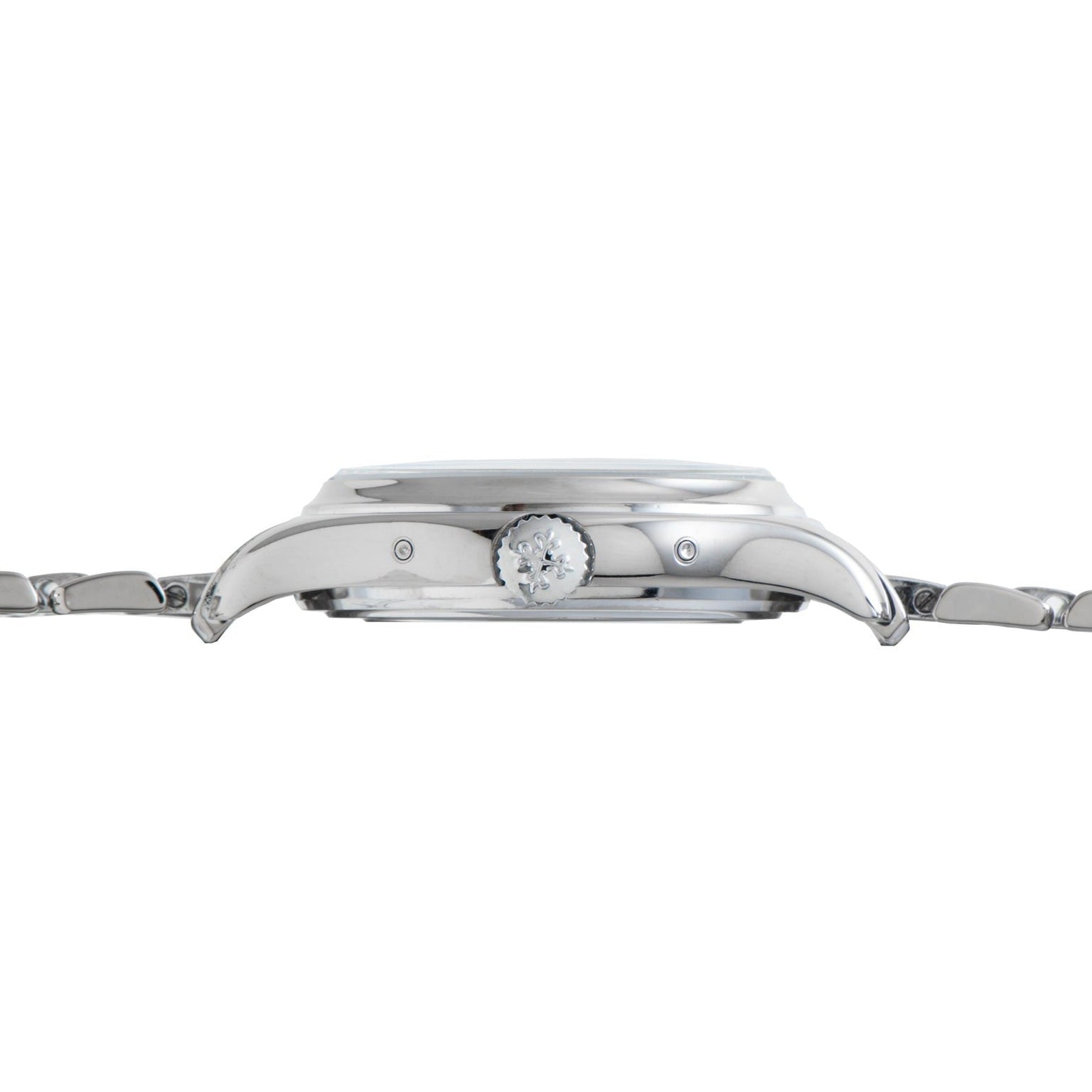 Side view of the Patek Philippe Annual Calendar, a silver wristwatch with crown and metal bracelet, displayed against a white background.