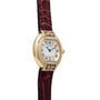 Cartier Ellipse watch with diamond accents, Roman numeral dial, and a burgundy textured leather strap.